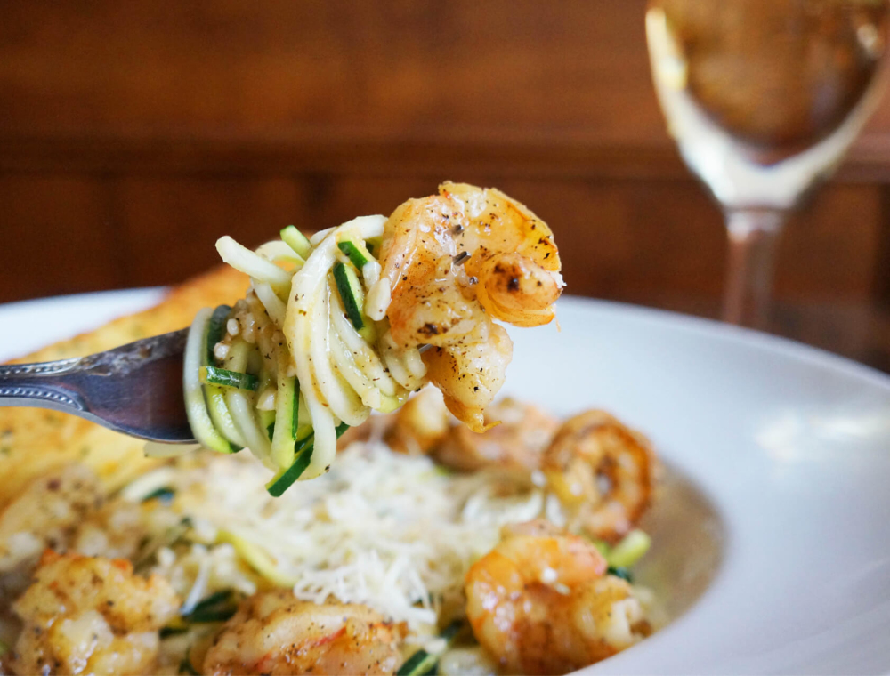 Curious about gluten-free options? Meet our Garlic Shrimp Zucchini with zucchini “noodles” (AKA zoodles) and blackened shrimp!