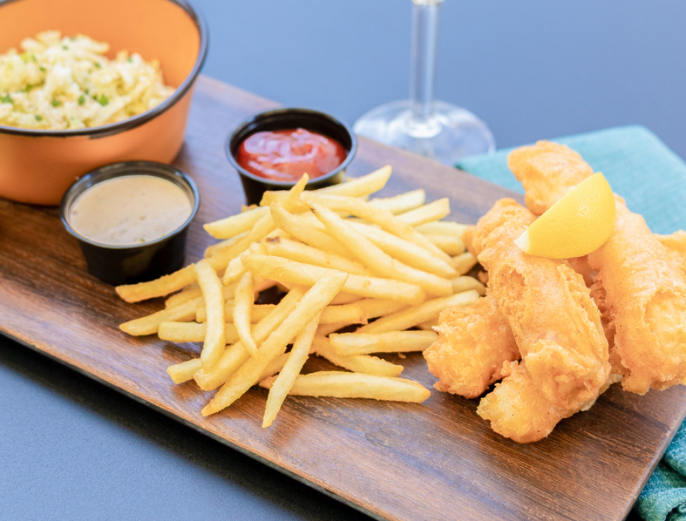 Beer-battered cod a side of honey slaw, skinny fries and tartar sauce for dipping.