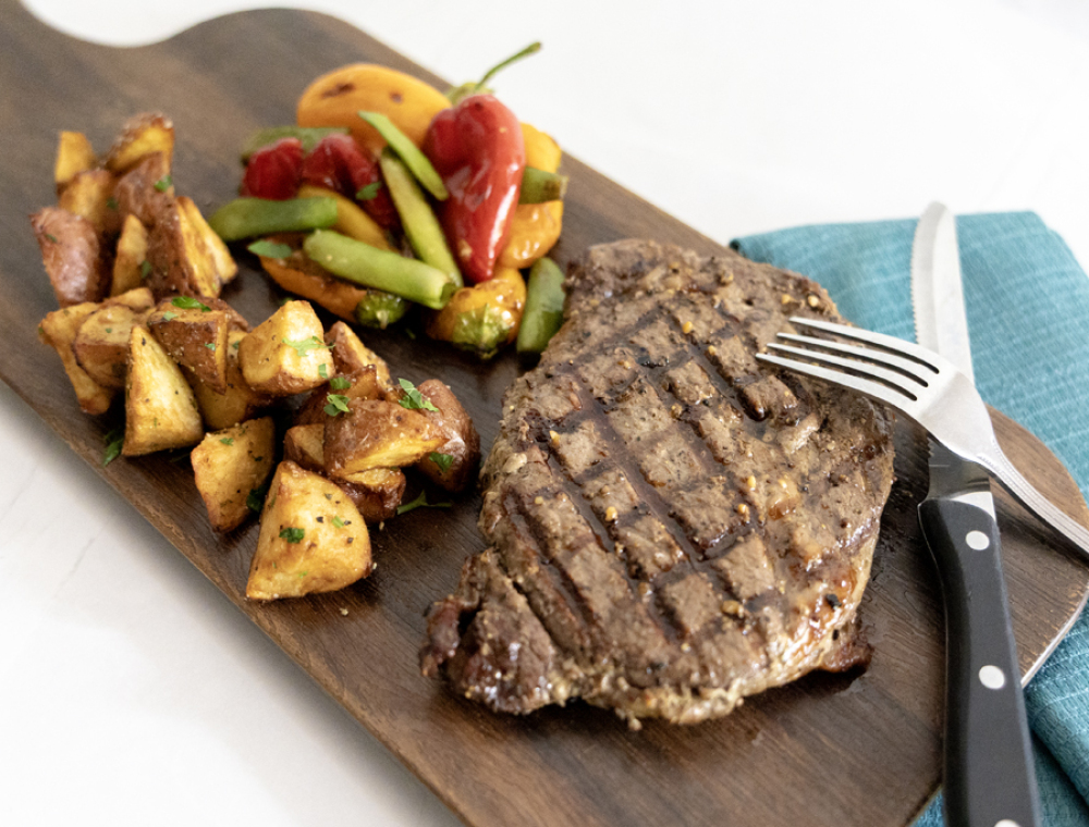 Beauty is in the ribeye beholder. We're serving a 12oz, flame-grilled, Certified Angus Beef Ribeye; with sugar snap peas, baby bell peppers, and roasted potatoes. 