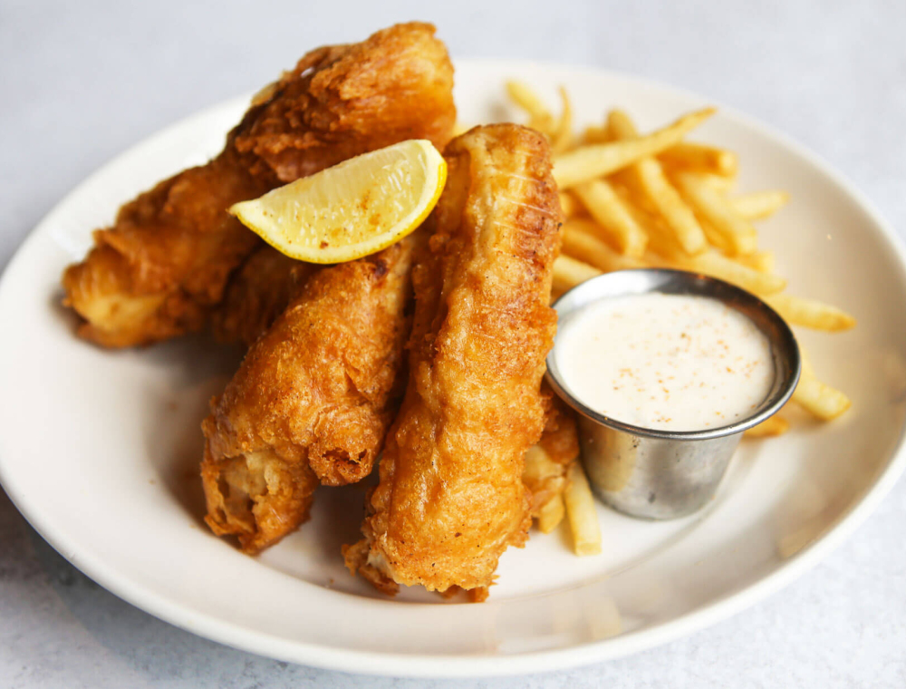 Beer-battered, flaky North Atlantic cod served with fries and house-made classic tartar sauce.