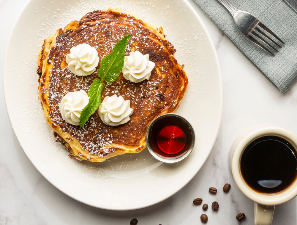 Brown sugar cold brew butter, powdered sugar, Chantilly whipped cream, mint, pure maple syrup