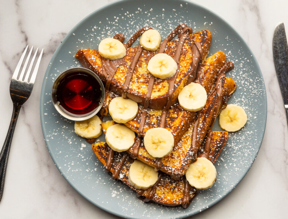 Thick-cut challah, Nutella, bananas, powdered sugar, pure maple syrup