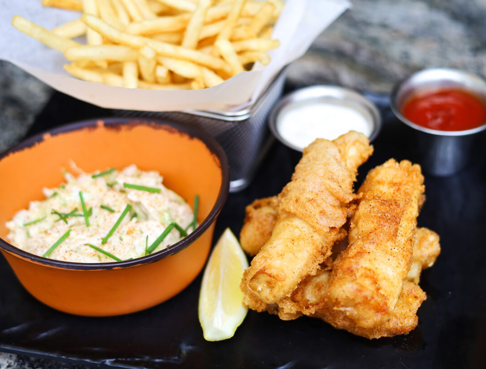 Beer-battered cod a side of honey slaw, skinny fries and tartar sauce for dipping.