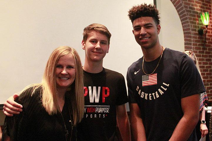Quentin Grimes with Play with a Purpose founders Karen and Hudson Boyd