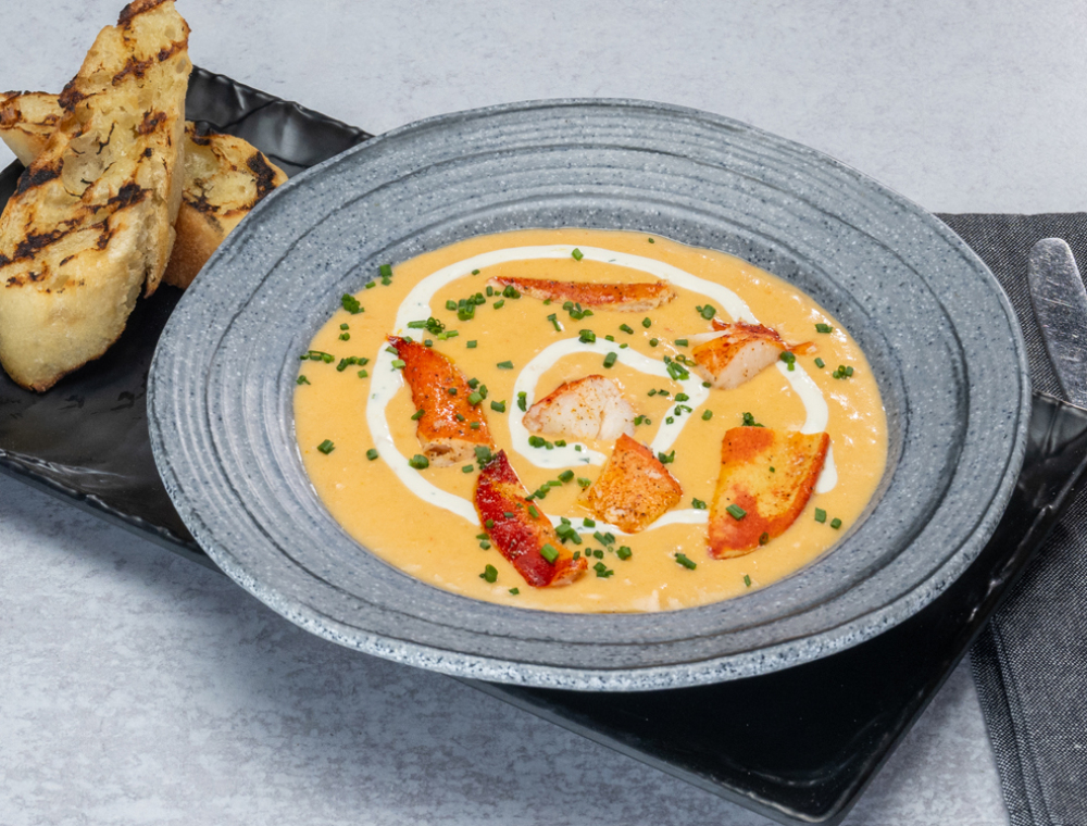 Lobster meat, lemon dill crema, chives, served with grilled artisan bread